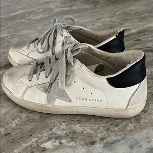 Golden Goose Cream and Black Star Sneakers